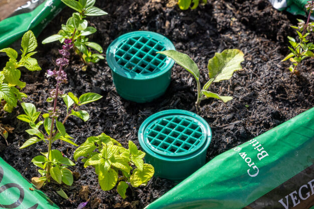 Grow bag waterers used in a wool compost bag